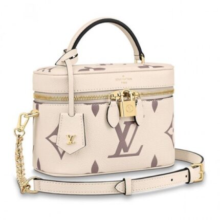 the Vanity PM handbag in Monogram Empreinte leather is a fashionably small bag with a distinctive shape. It is made from grained leather