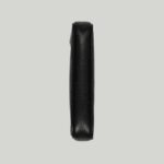 it's presented in a soft black leather with a gold-toned zip closure.