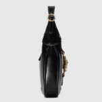 the second strap adds a contemporary feel to the archival style