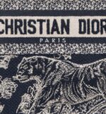 the style is entirely embroidered with the blue Toile de Jouy Reverse motif