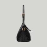 matching Gucci's contemporary vision. Presented here in black leather