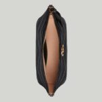 it's further enriched with antique gold-toned details.