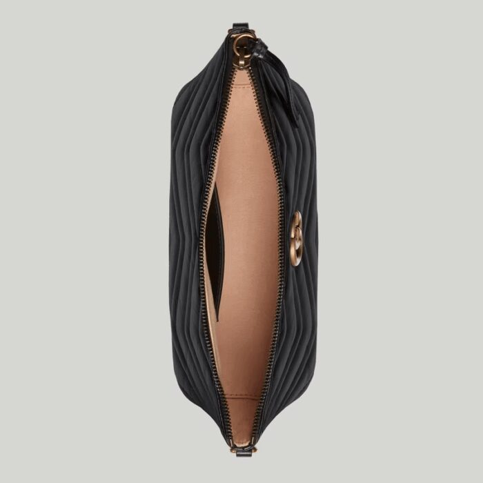 it's further enriched with antique gold-toned details.