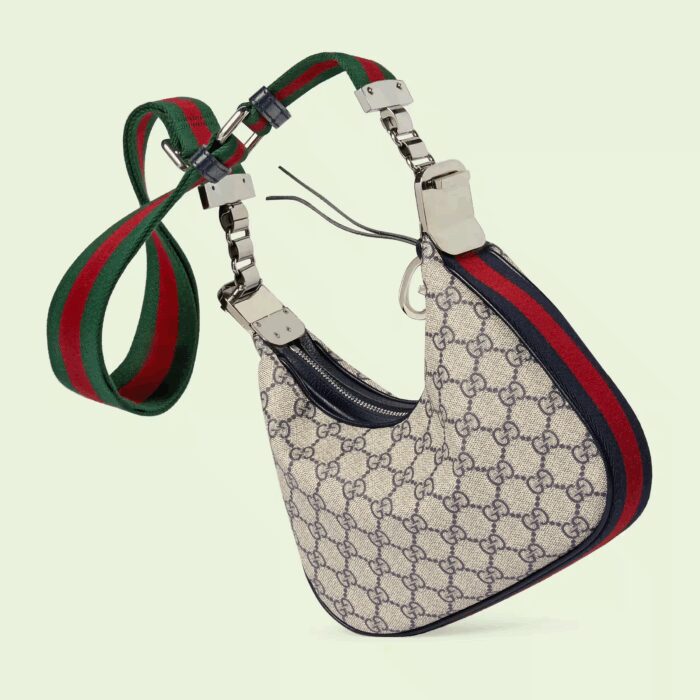 classic elements from the House's archives are reintroduced. Distinguished by its crescent moon shape