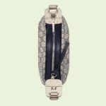 this small shoulder bag further defined by a G shaped hook closure. Paired with soft materials