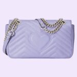 pastels continue to be explored throughout the latest collections. Made in matelassé chevron leather with a heart on the back in a light shade of lilac the now recognizable small GG Marmont chain shoulder bag has a softly structured shape and a flap closure with Double G hardware. Designed to be worn multiple ways