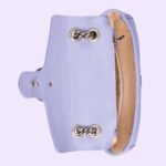 the chain strap slides to change between a shoulder and a top handle bag.