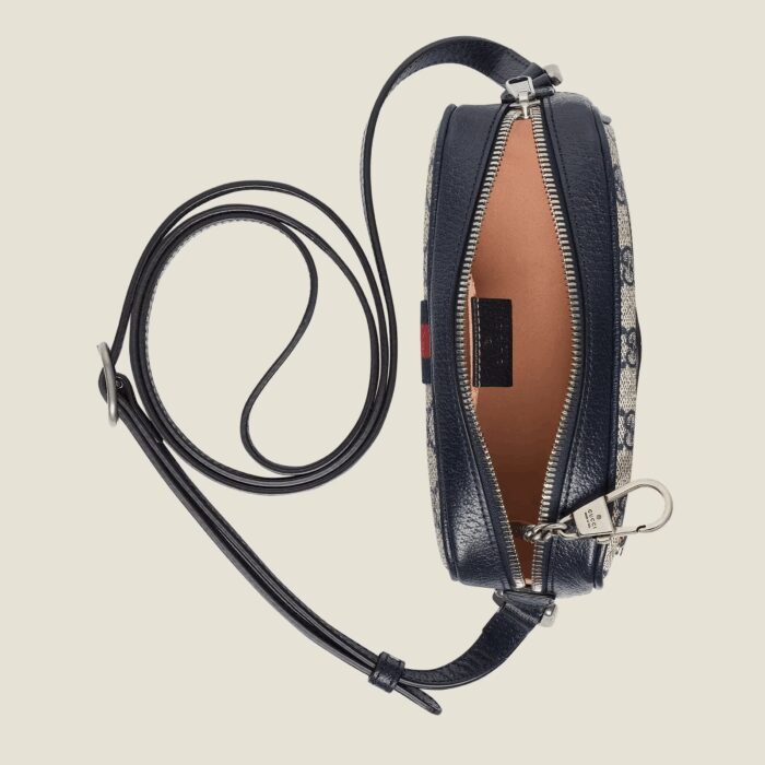 GG Supreme is introduced in a timeless mix of blue and beige for Gucci Love Parade. The canvas has come to the front of each collection decade after decade to become a hallmark of the House. Here