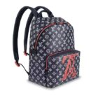 it is crafted of Monogram Ink canvas