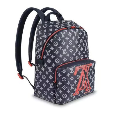 it is crafted of Monogram Ink canvas