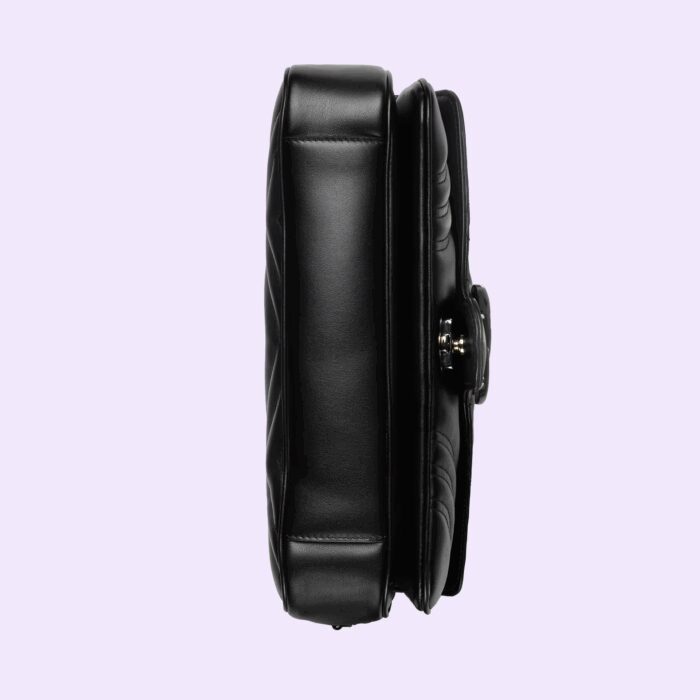 this shoulder bag is presented in black leather with tonal hardware.