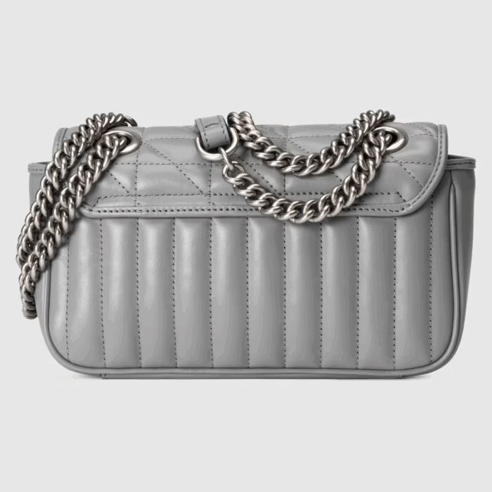 sans-serif; font-size: 12px; vertical-align: baseline; color: #4b4b4b; background-color: #ffffff;">The Gucci Aria collection is an exploration of the House's most emblematic codes and symbols. The GG Marmont is synonymous with its matelassé leather and monogram hardware. Here