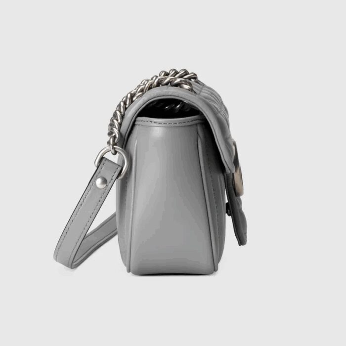 the mini shoulder bag is reimagined with a new geometric take on its signature finish that combines vertical and diagonal motifs.