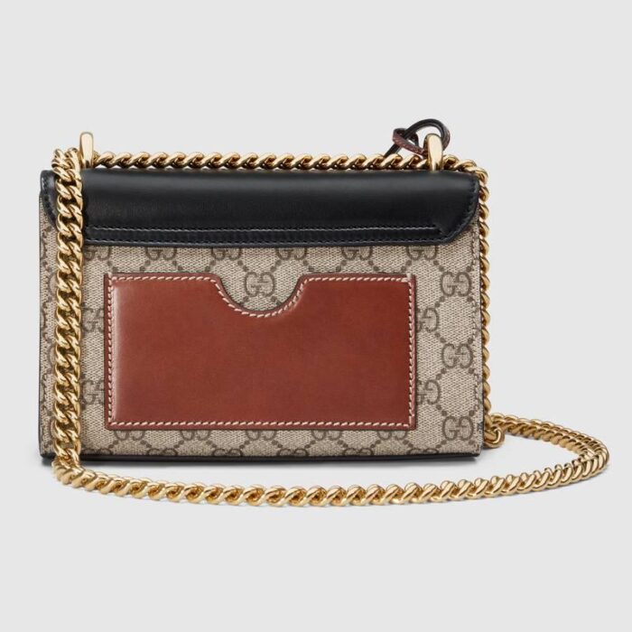 sans-serif; font-size: 16px; background-color: #ffffff;">This small GG Supreme canvas shoulder bag features a leather flap and key lock closure. The sliding chain bag can be worn in a variety of ways