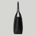 providing versatile accessories to complete any look. Two handles transform this tote bag