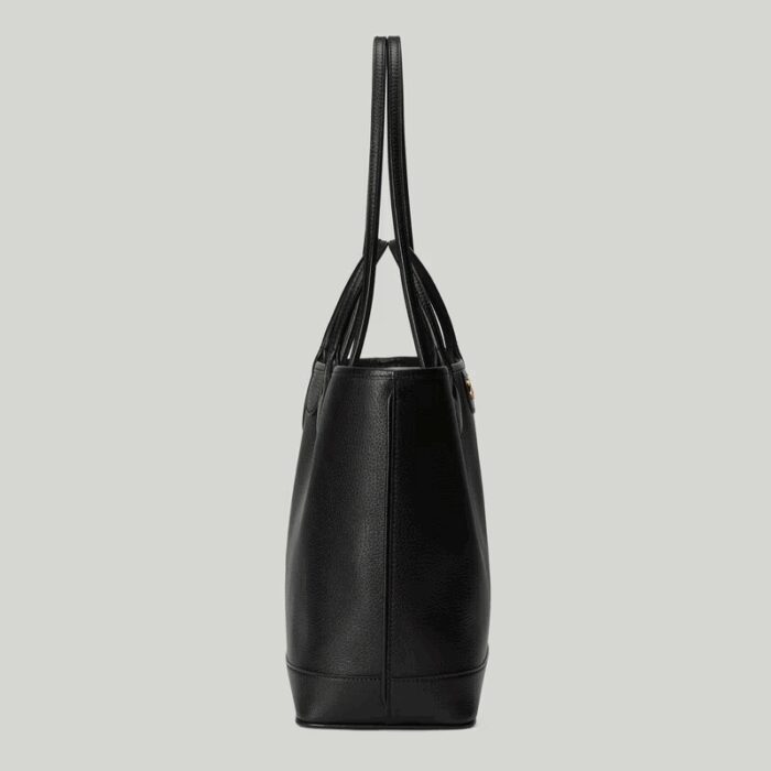providing versatile accessories to complete any look. Two handles transform this tote bag
