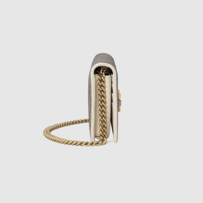 defined by the double ring and bar design also found in Handbags. The folded snap-closure shape features several card slots and pockets