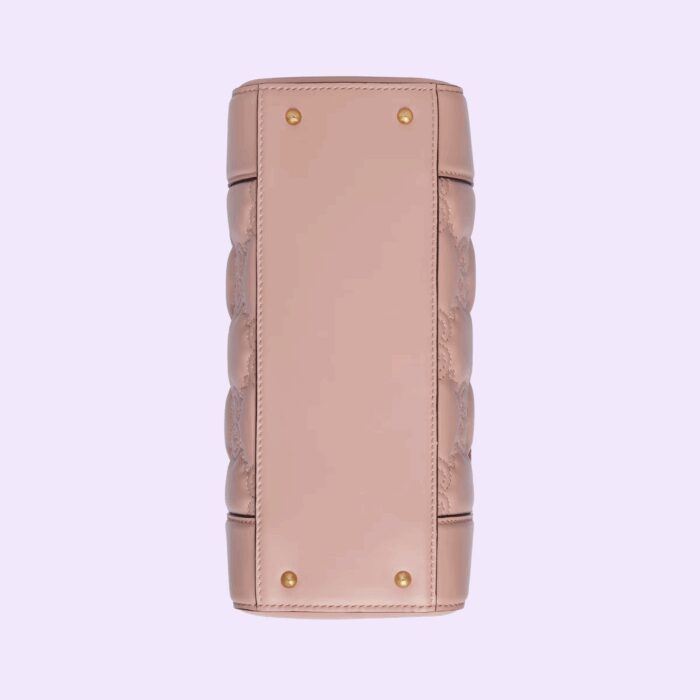 including this pink top handle mini bag. The Double G hardware decorates the front