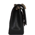 and adjustable interwoven?gold tone chain link and?black leather shoulder strap.