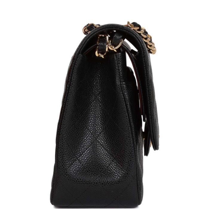 and adjustable interwoven?gold tone chain link and?black leather shoulder strap.