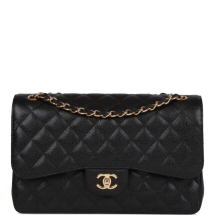 This Jumbo Classic Double Flap bag is in?black caviar leather with?gold tone hardware and features a front flap with signature CC turnlock closure