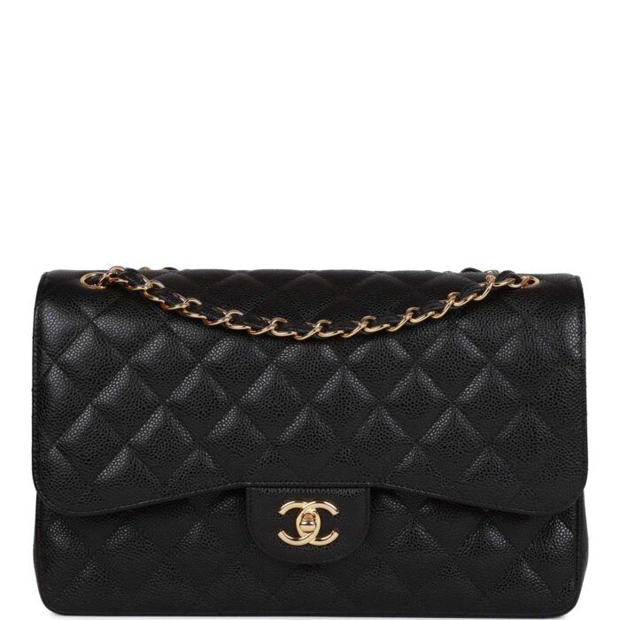 This Jumbo Classic Double Flap bag is in?black caviar leather with?gold tone hardware and features a front flap with signature CC turnlock closure