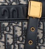 highlight the streamlined design. Featuring an adjustable leather shoulder strap