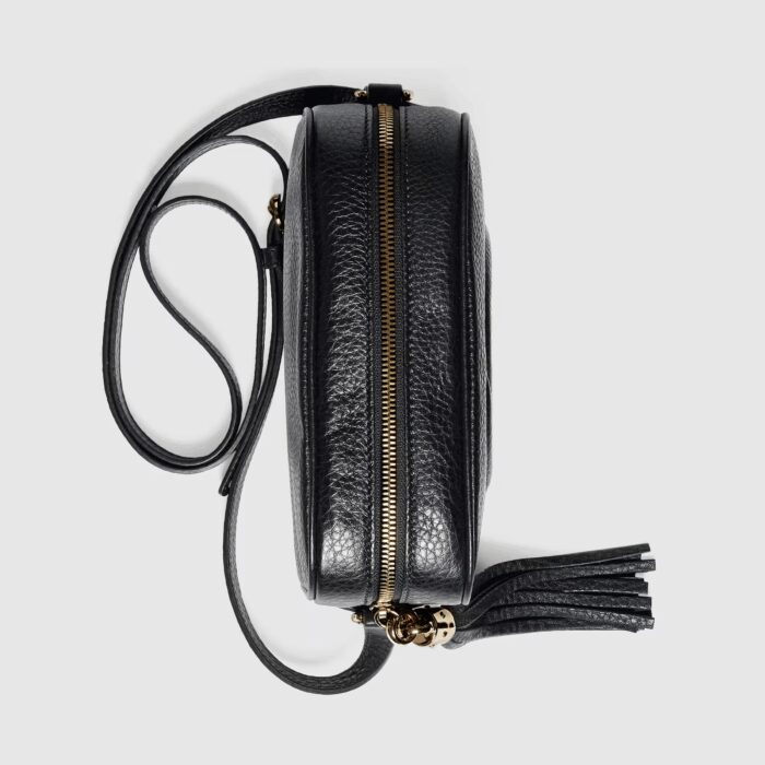 sans-serif; font-size: 12px; vertical-align: baseline; color: #4b4b4b; background-color: #ffffff;">A compact shoulder bag with a leather tassel zipper pull. Sized to fit the necessities. Made in our light