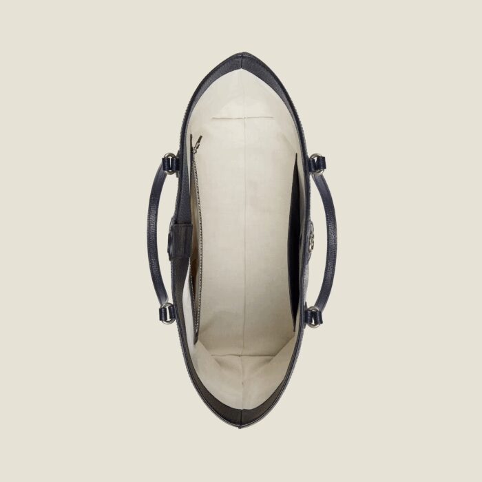 GG Supreme is introduced in a timeless mix of blue and beige for Gucci Love Parade. The canvas has come to the front of each collection decade after decade to become a hallmark of the House. Here