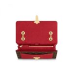 the bag can be worn cross-body or short-shoulder style.Detailed Features27 x 17 x 10 cm(Length x height x width )•Black•Monogram coated canvas and cowhide leather•Smooth cowhide-leather trim•Microfiber lining•Gold-color hardware•Metal clasp closure•Outside pocket•2 compartments•Inside zipped flat pocket•Chain: Sliding