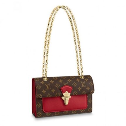 The Victoire chain bag pairs Monogram canvas with smooth colored leather for a sophisticated day-to-evening accessory. The golden clasp is modeled on the lock of classic Louis Vuitton luggage
