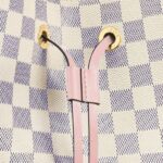 either slung over the shoulder or worn cross-body
