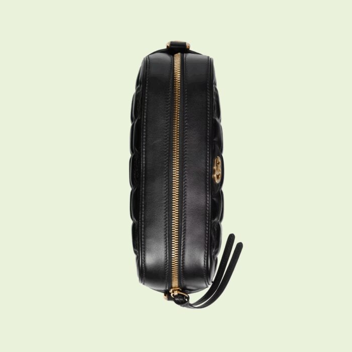 the signature material is reimagined once again as a part of Gucci Love Parade with a textured geometric motif. The design presents a contemporary approach to the '90s logo trend that appears throughout the House's latest collections. Here
