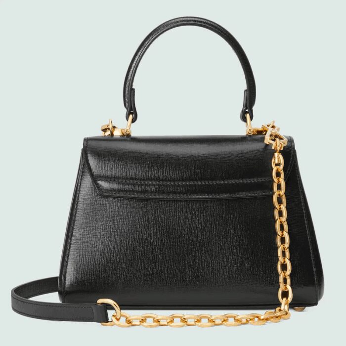 sans-serif; font-size: 12px; vertical-align: baseline; color: #4b4b4b; background-color: #ffffff;">The Gucci Horsebit 1955 is presented as a top handle bag in black leather. The collection unifies details first introduced on the original bag that inspired the line from over six decades ago with a modern spirit